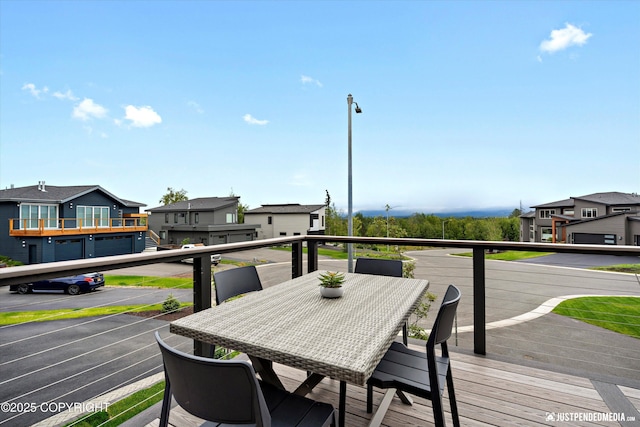 7864 Crane Cir, Anchorage, AK 99502 - wooden deck with a residential view