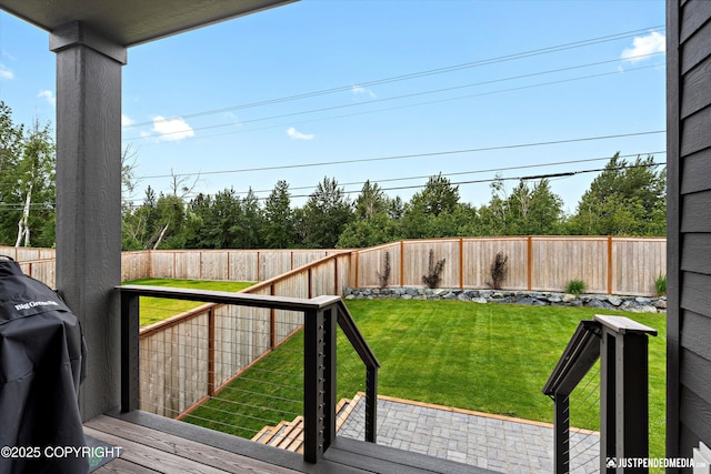 7864 Crane Cir, Anchorage, AK 99502 - deck with a fenced backyard and area for grilling