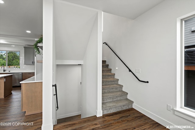 7864 Crane Cir, Anchorage, AK 99502 - stairs featuring wood finished floors and recessed lighting