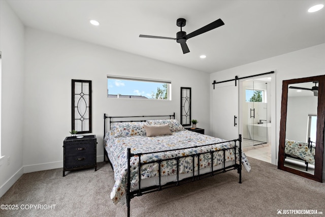 7864 Crane Cir, Anchorage, AK 99502 - bedroom featuring carpet floors, recessed lighting, a barn door, a ceiling fan, and connected bathroom