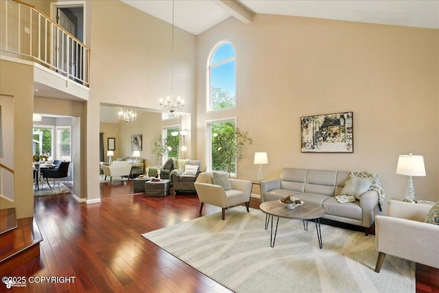2350 Ariel Cir, Anchorage, AK 99515 - living area featuring a chandelier, plenty of natural light, hardwood / wood-style flooring, high vaulted ceiling, and beam ceiling