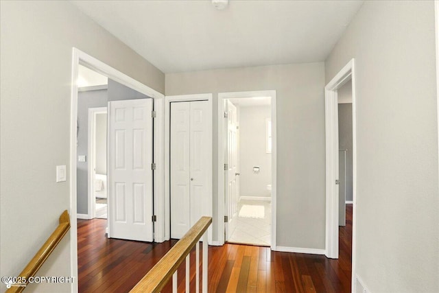 2350 Ariel Cir, Anchorage, AK 99515 - hall featuring dark wood-style floors and baseboards