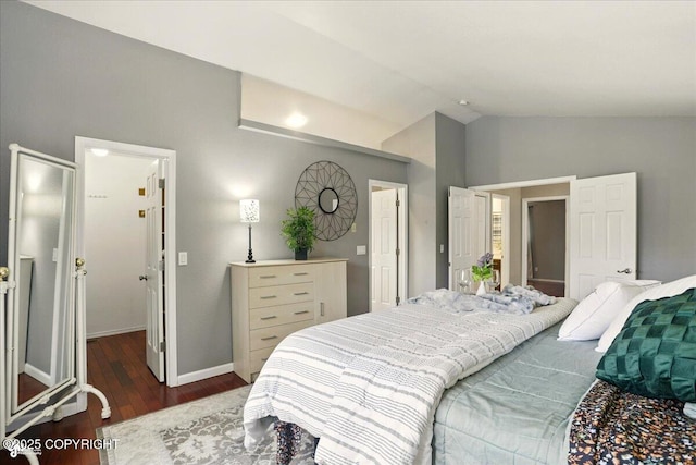 2350 Ariel Cir, Anchorage, AK 99515 - bedroom with wood finished floors, lofted ceiling, and baseboards