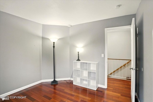 2350 Ariel Cir, Anchorage, AK 99515 - empty room featuring wood finished floors, baseboards, and a smoke detector