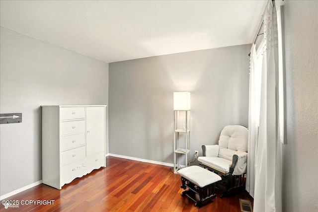 2350 Ariel Cir, Anchorage, AK 99515 - sitting room with wood finished floors and baseboards