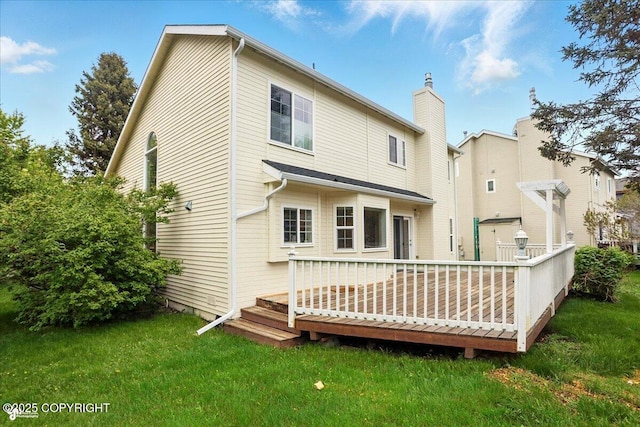 2350 Ariel Cir, Anchorage, AK 99515 - back of house with a wooden deck, a yard, and a chimney