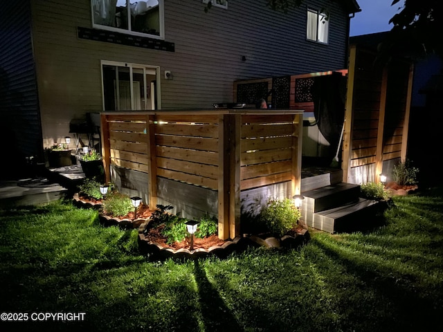 5893 Kenai Fjords Loop, Anchorage, AK 99502 - back of house with a lawn