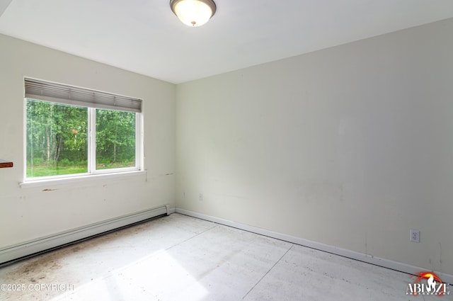 4106 E Country Fair Dr # A, Wasilla, AK 99654 - unfurnished room with baseboard heating, baseboards, and concrete floors