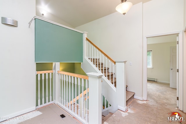 4106 E Country Fair Dr # A, Wasilla, AK 99654 - stairway with a baseboard radiator and vaulted ceiling