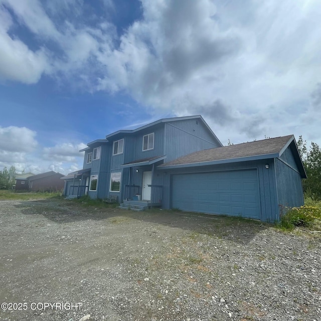 14154 Jojoba Dr, Wasilla, AK 99654 - view of front of house featuring an attached garage