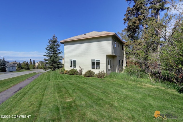 16059 Hidden Creek Ln, Anchorage, AK 99516 - view of property exterior with a yard