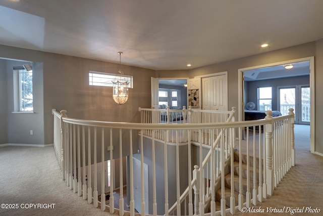 16059 Hidden Creek Ln, Anchorage, AK 99516 - hallway with an upstairs landing, carpet, plenty of natural light, and recessed lighting