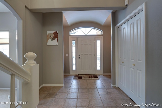 16059 Hidden Creek Ln, Anchorage, AK 99516 - entrance foyer featuring arched walkways and baseboards