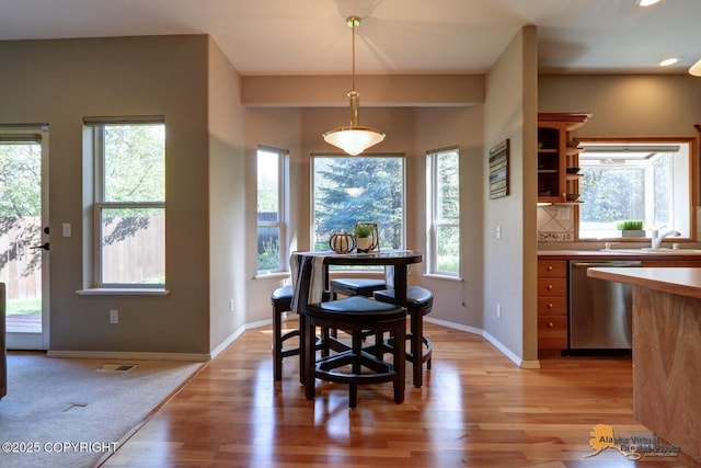 16059 Hidden Creek Ln, Anchorage, AK 99516 - dining space with light wood-style floors, baseboards, and recessed lighting