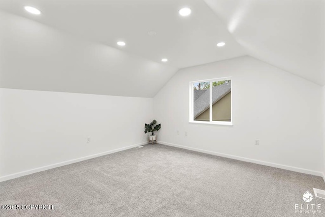 1338 N Unicorn Cir, Palmer, AK 99645 - bonus room with lofted ceiling, recessed lighting, carpet flooring, and baseboards