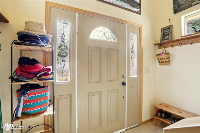 142 Vail Cir, Girdwood, AK 99587 - foyer featuring healthy amount of natural light and baseboards