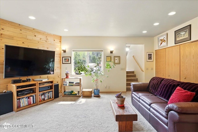 142 Vail Cir, Girdwood, AK 99587 - living area with carpet flooring, recessed lighting, stairs, and wood walls