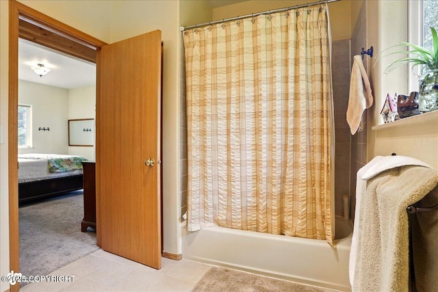 142 Vail Cir, Girdwood, AK 99587 - ensuite bathroom with tile patterned floors and shower / bathtub combination with curtain