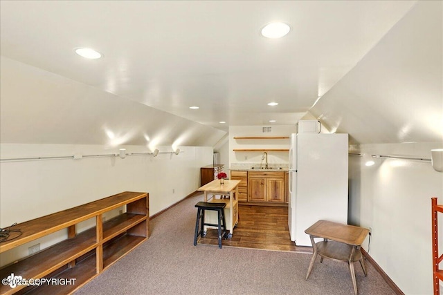 142 Vail Cir, Girdwood, AK 99587 - additional living space featuring a sink, dark carpet, vaulted ceiling, recessed lighting, and baseboards