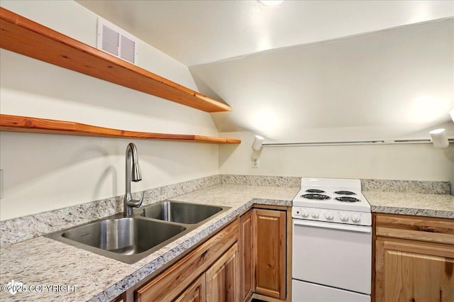 142 Vail Cir, Girdwood, AK 99587 - kitchen with white electric range oven, open shelves, a sink, light countertops, and vaulted ceiling