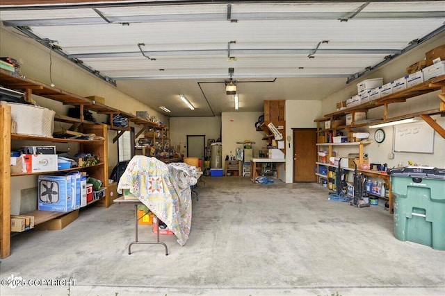142 Vail Cir, Girdwood, AK 99587 - garage featuring a workshop area and gas water heater