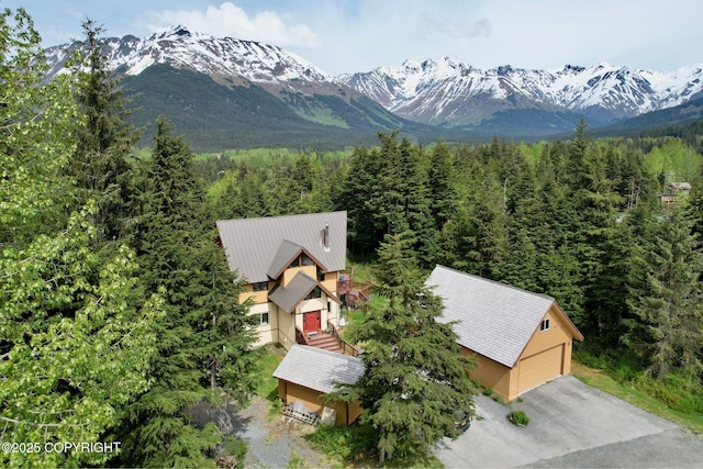 142 Vail Cir, Girdwood, AK 99587 - mountain view featuring a heavily wooded area