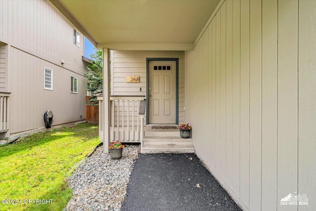 268 Dailey Ave, Anchorage, AK 99515 - doorway to property with a yard