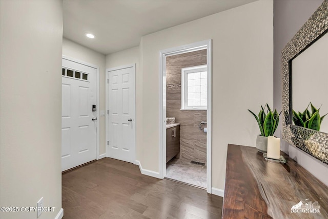 268 Dailey Ave, Anchorage, AK 99515 - foyer entrance with dark wood-style flooring and baseboards
