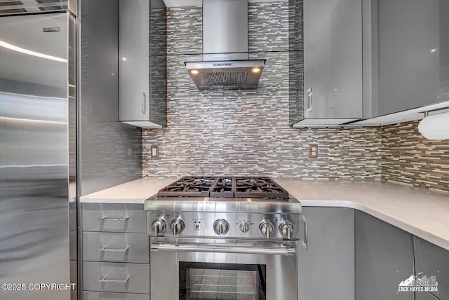 268 Dailey Ave, Anchorage, AK 99515 - kitchen with gray cabinets, stainless steel appliances, backsplash, and light countertops