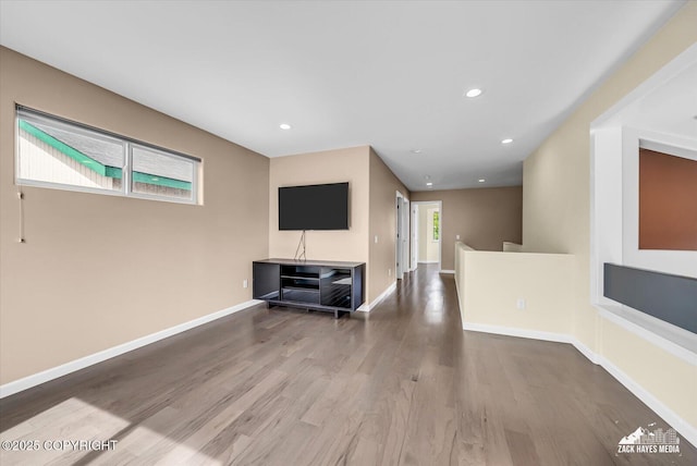 268 Dailey Ave, Anchorage, AK 99515 - unfurnished living room featuring wood finished floors, baseboards, and recessed lighting