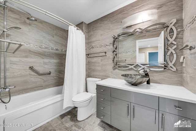 268 Dailey Ave, Anchorage, AK 99515 - full bath with tile walls, shower / tub combo with curtain, vanity, and toilet