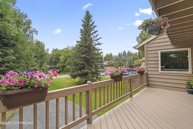 11751 Mary Ave, Anchorage, AK 99515 - wooden deck featuring a yard