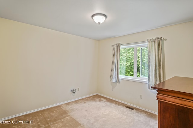 11751 Mary Ave, Anchorage, AK 99515 - unfurnished room with light colored carpet and baseboards