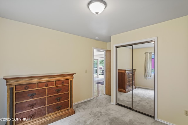 11751 Mary Ave, Anchorage, AK 99515 - bedroom with a closet and light colored carpet