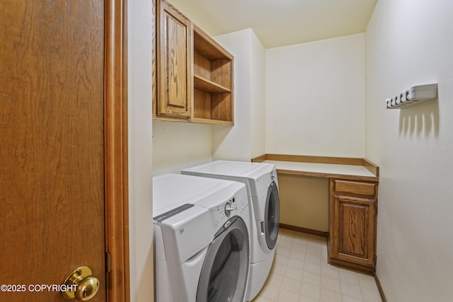 11751 Mary Ave, Anchorage, AK 99515 - laundry area featuring independent washer and dryer, light floors, and cabinet space