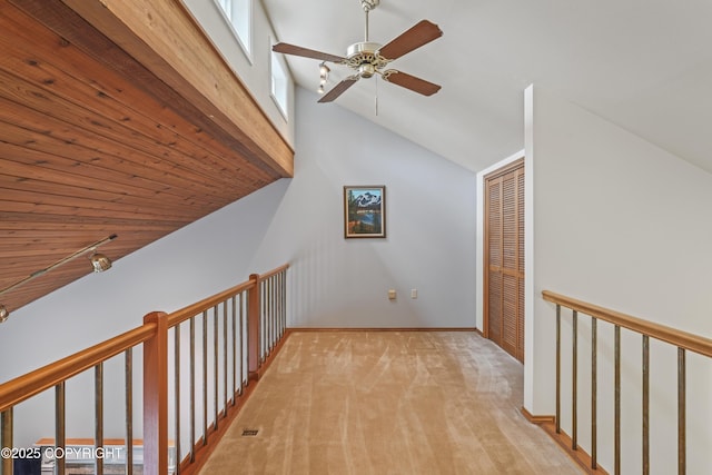 11751 Mary Ave, Anchorage, AK 99515 - hallway featuring lofted ceiling and carpet flooring