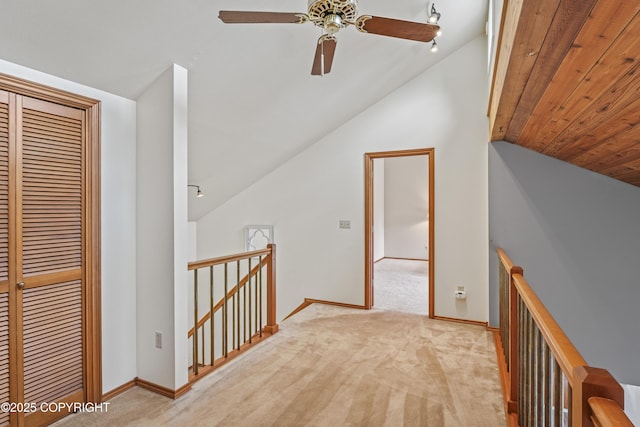 11751 Mary Ave, Anchorage, AK 99515 - corridor with an upstairs landing, lofted ceiling, and light carpet