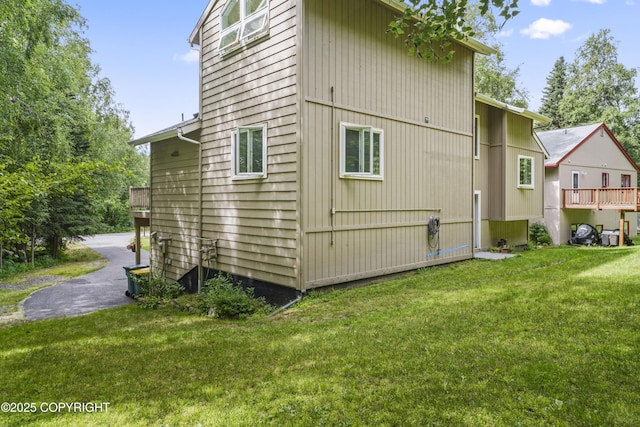11751 Mary Ave, Anchorage, AK 99515 - view of side of home featuring a lawn