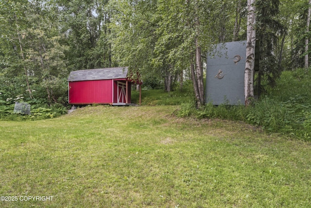 11751 Mary Ave, Anchorage, AK 99515 - view of grassy yard with a shed
