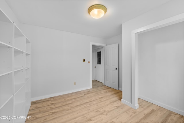 1855 Mission Rd, Homer, AK 99603 - unfurnished room featuring wood finished floors and baseboards
