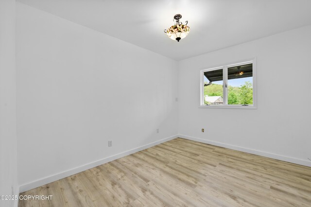 1855 Mission Rd, Homer, AK 99603 - empty room featuring light wood finished floors