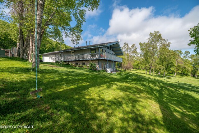 1855 Mission Rd, Homer, AK 99603 - view of green lawn featuring a wooden deck