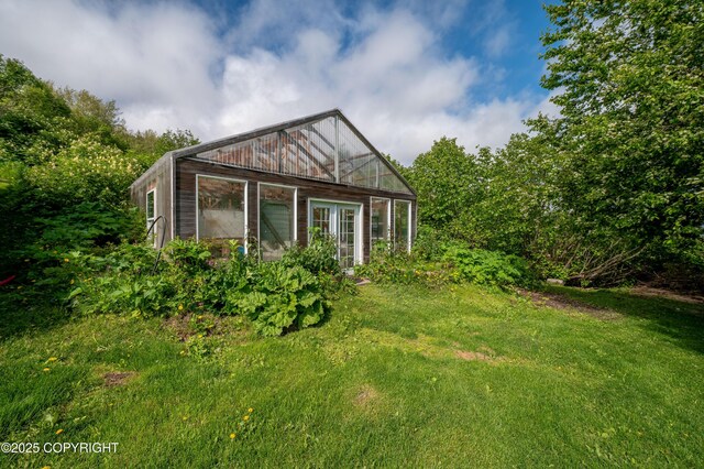 1855 Mission Rd, Homer, AK 99603 - back of property with an outbuilding and a greenhouse