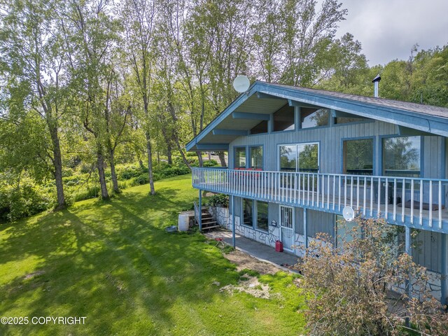 1855 Mission Rd, Homer, AK 99603 - view of front facade featuring a front lawn, stairs, and a wooden deck