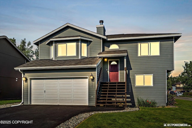 7821 Charlotte Cir, Anchorage, AK 99502 - bi-level home with a garage, a chimney, asphalt driveway, a lawn, and a shingled roof