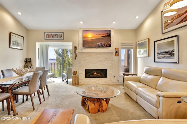 333 M St # 402, Anchorage, AK 99501 - carpeted living area featuring a large fireplace and recessed lighting