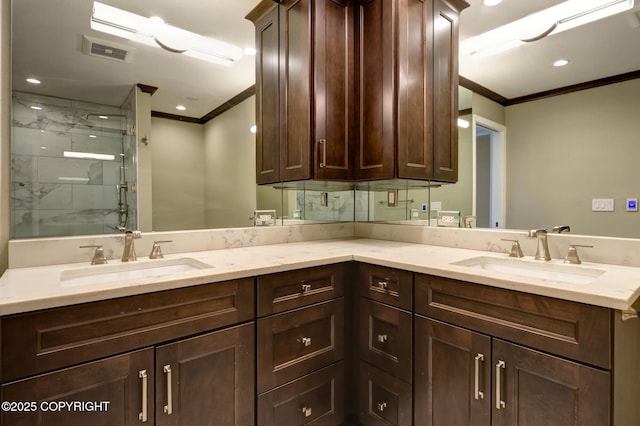 333 M St # 402, Anchorage, AK 99501 - bathroom with ornamental molding, double vanity, tiled shower, and recessed lighting