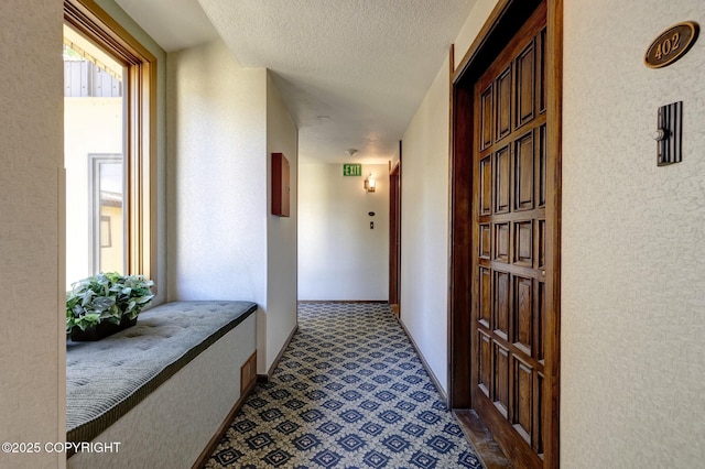 333 M St # 402, Anchorage, AK 99501 - hallway featuring a textured ceiling