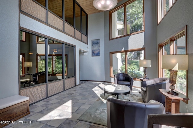 333 M St # 402, Anchorage, AK 99501 - living room with a towering ceiling and tile patterned flooring