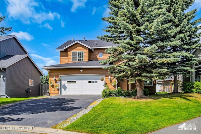 10201 Sextant Cir, Anchorage, AK 99515 - view of front of property with asphalt driveway, an attached garage, a front yard, and a shingled roof